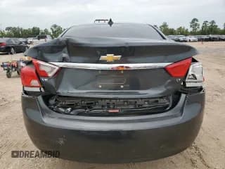 ✅ 2018 Chevrolet Impala LT • VIN: 2G1105S30J9117344 • Лот: 63138794. Опубликован ранее на Copart с пробегом 97 964 миль. Бесплатный доступ к архиву аукционных продаж из США и подробный отчёт об истории автомобиля на DreamBid. Изображение 6.