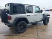 ✅ 2023 Jeep Wrangler Rubicon • VIN: 1C4JJXR63PW696801 • Lot: 43040800. Listed on IAAI with 2,699 mi. Free auction sales archive from the USA and detailed vehicle history report at DreamBid. Image 4.