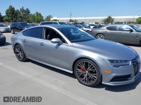 ✅ 2016 Audi A7 Prestige • VIN: WAU2GAFC3GN002153 • Lot: 42292870. Listed on IAAI with 161,013 mi. Free auction sales archive from the USA and detailed vehicle history report at DreamBid. Image 1.