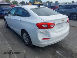 ✅ 2018 Chevrolet Cruze LS • VIN: 1G1BC5SM3J7154006 • Lot: 43304387. Listed on IAAI with 118,821 mi. Free auction sales archive from the USA and detailed vehicle history report at DreamBid. Image 3.