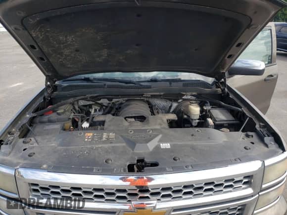 2014 Chevrolet Silverado 1500 LT с VIN 1GCVKREC3EZ300772, выставлен на аукционе Copart как лот 70127165 с пробегом 208 135 миль миль и Списание • Salvage title. История ставок и продаж доступна на DreamBid. Изображение 11.