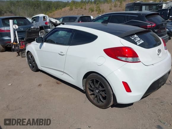 ✅ 2014 Hyundai Veloster • VIN: KMHTC6AD1EU217707 • Lot: 41718176. Wystawiony na IAAI z przebiegiem 191 306 mil. Bezpłatny archiwum sprzedaży aukcyjnych z USA i szczegółowy raport historii pojazdu na DreamBid. Zdjęcie 3.