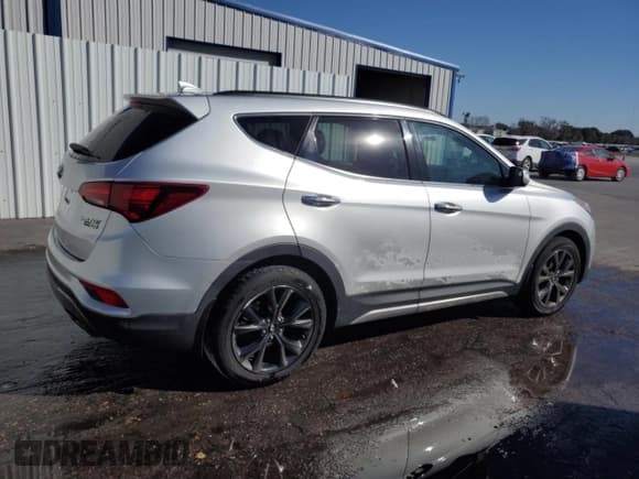✅ 2017 Hyundai Santa Fe Ultimate • VIN: 5XYZWDLA4HG412610 • Lot: 92193065. Listed on Copart with 114,935 mi. Free auction sales archive from the USA and detailed vehicle history report at DreamBid. Image 3.