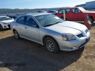 ✅ 2005 Mitsubishi Galant ES • VIN: 4A3AB46F75E013904 • Lot: 42620695. Listed on IAAI with 106,569 mi. Free auction sales archive from the USA and detailed vehicle history report at DreamBid. Image 1.