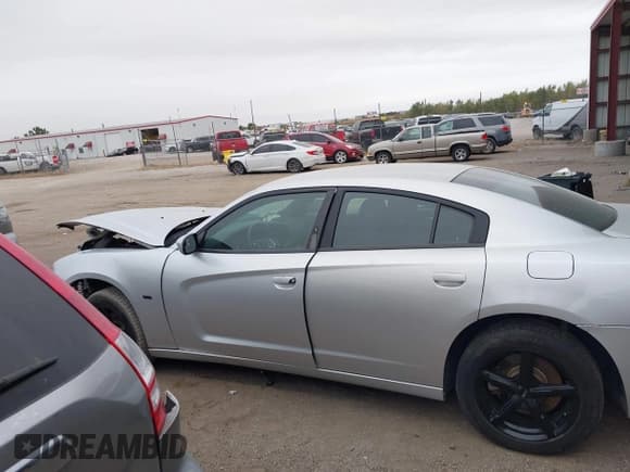 ✅ 2012 Dodge Charger Police • VIN: 2C3CDXAT1CH305496 • Lot: 43428332. Listed on IAAI with 249,533 mi. Free auction sales archive from the USA and detailed vehicle history report at DreamBid. Image 15.
