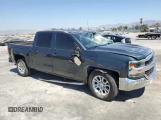 ✅ 2018 Chevrolet Silverado 1500 LT • VIN: 3GCPCREC6JG575679 • Лот: 71061974. Опубликован ранее на Copart с пробегом 127 003 миль. Бесплатный доступ к архиву аукционных продаж из США и подробный отчёт об истории автомобиля на DreamBid. Изображение 4.