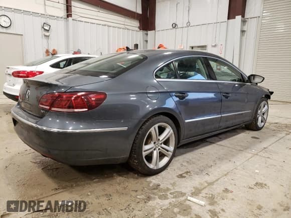 ✅ 2013 Volkswagen CC R-Line • VIN: WVWBP7AN4DE501831 • Lot: 86886234. Listed on Copart with Not provided. Free auction sales archive from the USA and detailed vehicle history report at DreamBid. Image 3.