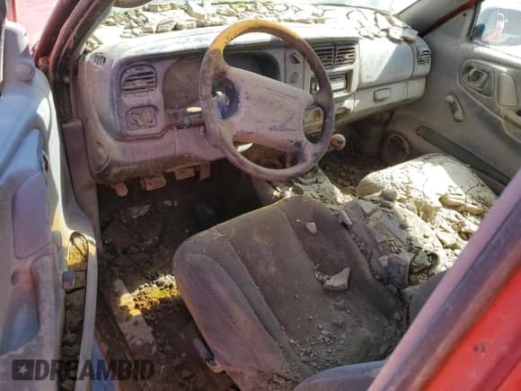 2000 Dodge Dakota z VIN 1B7FL26P7YS630499, wystawiony jako Copart lot #46513094 z przebiegiem Nie podano mil oraz Nie do naprawy • Non repairable. Historia ofert i sprzedaży dostępna na DreamBid. Obrazek 8.