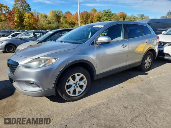 ✅ 2013 Mazda CX-9 Sport • VIN: JM3TB3BV8D0402167 • Lot: 86886135. Listed on Copart with 118,145 mi. Free auction sales archive from the USA and detailed vehicle history report at DreamBid. Image 1.