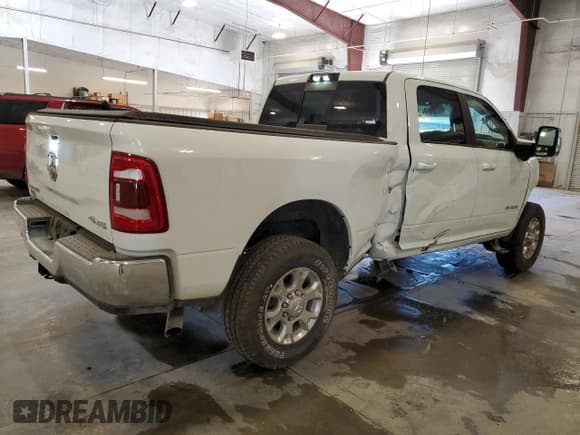 ✅ 2024 Ram 2500 Laramie • VIN: 3C6UR5FJ2RG231468 • Lot: 87484775. Listed on Copart with 7,097 mi. Free auction sales archive from the USA and detailed vehicle history report at DreamBid. Image 3.