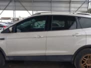 ✅ 2015 Ford Escape Titanium • VIN: 1FMCU0J91FUA27610 • Lot: 42095995. Listed on IAAI with 122,521 mi. Free auction sales archive from the USA and detailed vehicle history report at DreamBid. Image 15.