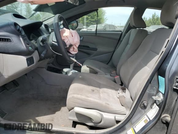 ✅ 2012 Honda Insight • VIN: JHMZE2H34CS006488 • Lot: 54203575. Listed on Copart with Not provided. Free auction sales archive from the USA and detailed vehicle history report at DreamBid. Image 7.