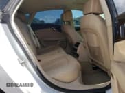 ✅ 2013 Audi A7 Premium Plus • VIN: WAUYGAFC6DN053636 • Лот: 87428435. Опубликован ранее на Copart с пробегом Не указан. Бесплатный доступ к архиву аукционных продаж из США и подробный отчёт об истории автомобиля на DreamBid. Изображение 10.