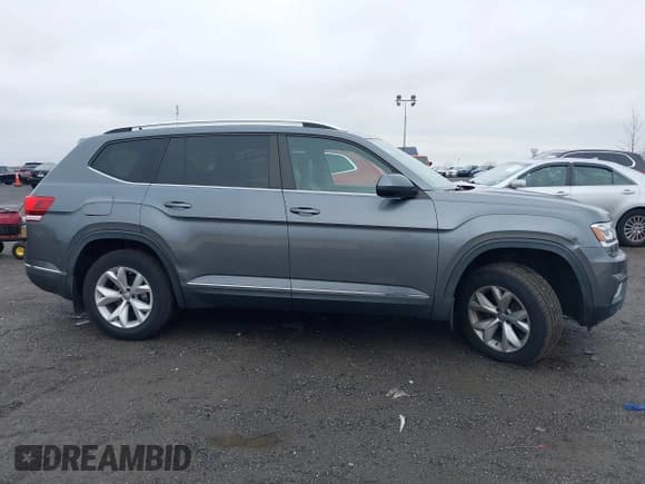 ✅ 2018 Volkswagen Atlas SEL • VIN: 1V2MR2CA0JC523704 • Lot: 43776121. Wystawiony na IAAI z przebiegiem 72 782 mil. Bezpłatny archiwum sprzedaży aukcyjnych z USA i szczegółowy raport historii pojazdu na DreamBid. Zdjęcie 13.