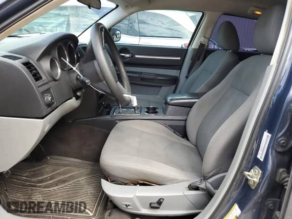 2008 Dodge Charger SXT с VIN 2B3KA33G18H275644, выставлен на аукционе Copart как лот 71127934 с пробегом 163 826 миль миль и Списание • Salvage title. История ставок и продаж доступна на DreamBid. Изображение 7.