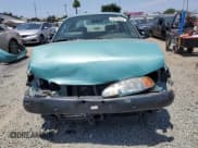 ✅ 1999 Ford Escort LX • VIN: 1FAFP10P6XW196483 • Lot: 59215635. Listed on Copart with 74,859 mi. Free auction sales archive from the USA and detailed vehicle history report at DreamBid. Image 5.