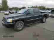 2006 Dodge Dakota SLT z VIN 1D7HW48N56S678965, wystawiony jako Copart lot #70227054 z przebiegiem 159 890 mil mil oraz Szkoda całkowita • Salvage title. Historia ofert i sprzedaży dostępna na DreamBid. Obrazek 1.