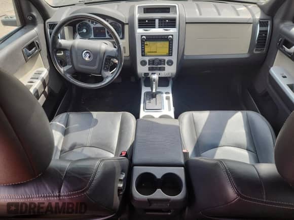 2010 Mercury Mariner Premier с VIN 4M2CN9HG9AKJ15491, выставлен на аукционе Copart как лот 70665985 с пробегом 198 092 миль миль и На запчасти • Non repairable. История ставок и продаж доступна на DreamBid. Изображение 8.