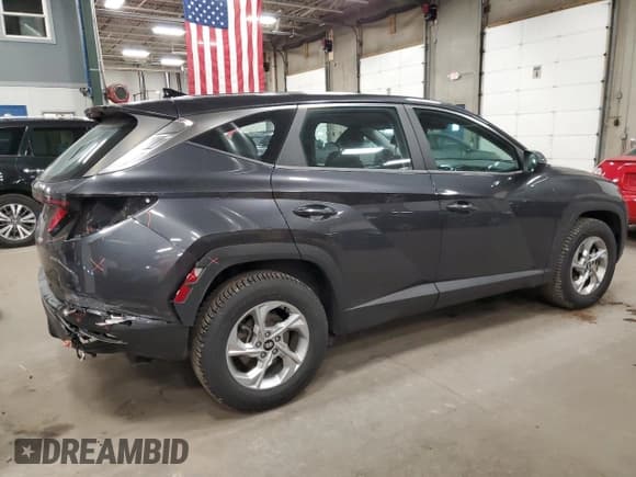 ✅ 2022 Hyundai Tucson SE • VIN: 5NMJACAE1NH079800 • Lot: 87449515. Listed on Copart with 62,447 mi. Free auction sales archive from the USA and detailed vehicle history report at DreamBid. Image 3.