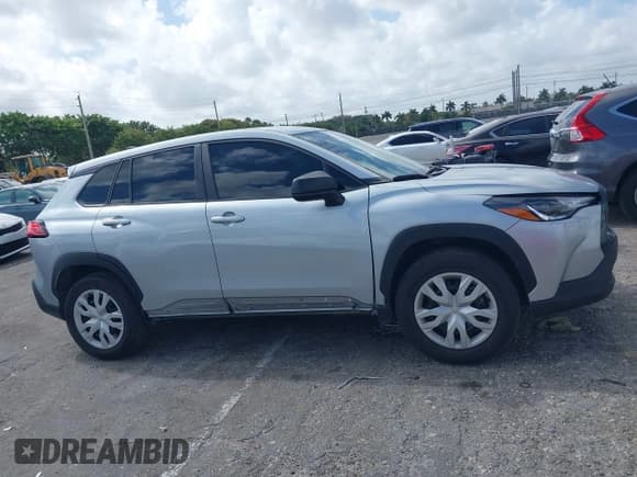 ✅ 2022 Toyota Corolla Cross L • VIN: 7MUAAAAG8NV030229 • Lot: 41952236. Listed on IAAI with 42,459 mi. Free auction sales archive from the USA and detailed vehicle history report at DreamBid. Image 13.