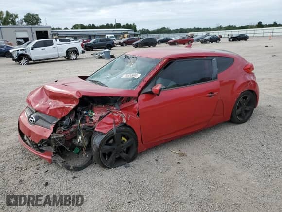 2012 Hyundai Veloster w/Gray Int с VIN KMHTC6AD8CU051215, выставлен на аукционе Copart как лот 70504994 с пробегом 162 522 миль миль и Списание • Salvage title. История ставок и продаж доступна на DreamBid. Изображение 1.