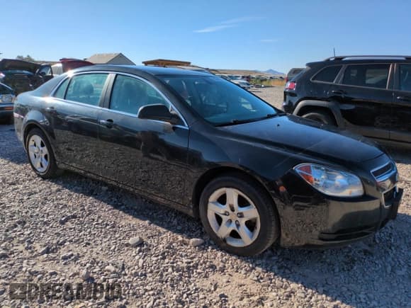 ✅ 2011 Chevrolet Malibu 1LS • VIN: 1G1ZB5E16BF335952 • Lot: 68366575. Listed on Copart with 196,084 mi. Free auction sales archive from the USA and detailed vehicle history report at DreamBid. Image 4.