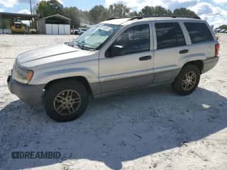 2004 Jeep Grand Cherokee Laredo с VIN 1J4GX48S64C302687, выставлен на аукционе Copart как лот 85599075 с пробегом 213 057 миль миль и Списание • Salvage title. История ставок и продаж доступна на DreamBid. Изображение 1.