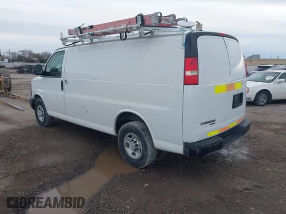 ✅ 2013 Chevrolet Express Cargo • VIN: 1GCWGFCAXD1140635 • Lot: 43410975. Listed on IAAI with 185,343 mi. Free auction sales archive from the USA and detailed vehicle history report at DreamBid. Image 3.