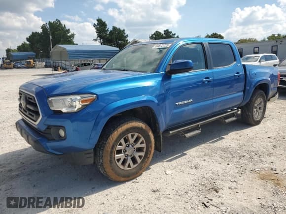 ✅ 2018 Toyota Tacoma SR5 • VIN: 5TFAZ5CN7JX065614 • Лот: 84872725. Опубликован ранее на Copart с пробегом 127 334 миль. Бесплатный доступ к архиву аукционных продаж из США и подробный отчёт об истории автомобиля на DreamBid. Изображение 1.