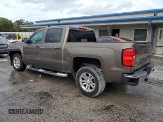 ✅ 2014 Chevrolet Silverado 1500 LT • VIN: 3GCPCREC3EG239266 • Лот: 75282994. Опубликован ранее на Copart с пробегом 99 821 миль. Бесплатный доступ к архиву аукционных продаж из США и подробный отчёт об истории автомобиля на DreamBid. Изображение 2.