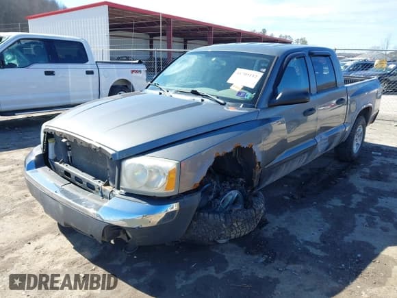 ✅ 2006 Dodge Dakota SLT • VIN: 1D7HW48NX6S639546 • Лот: 41709112. Опубликован ранее на IAAI с пробегом 182 478 миль. Бесплатный доступ к архиву аукционных продаж из США и подробный отчёт об истории автомобиля на DreamBid. Изображение 2.