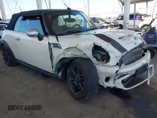 ✅ 2014 MINI Convertible S • VIN: WMWZP3C5XET706911 • Lot: 42217410. Listed on IAAI with 54,649 mi. Free auction sales archive from the USA and detailed vehicle history report at DreamBid. Image 1.