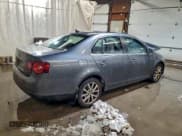 ✅ 2010 Volkswagen Jetta SE • VIN: 3VWRZ7AJ1AM034327 • Lot: 94899375. Listed on Copart with Not provided. Free auction sales archive from the USA and detailed vehicle history report at DreamBid. Image 3.