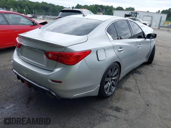 ✅ 2014 Infiniti Q50 Premium • VIN: JN1BV7AR0EM702063 • Лот: 42992571. Опубликован ранее на IAAI с пробегом 140 002 миль. Бесплатный доступ к архиву аукционных продаж из США и подробный отчёт об истории автомобиля на DreamBid. Изображение 4.