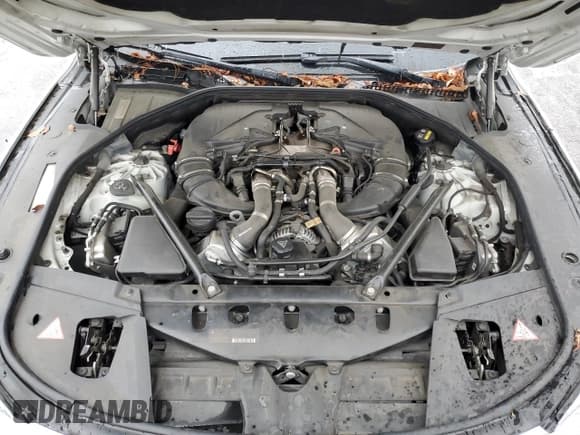 ✅ 2015 BMW 7 Series 750i • VIN: WBAYA8C56FD825593 • Lot: 93120375. Wystawiony na Copart z przebiegiem 67 663 mil. Bezpłatny archiwum sprzedaży aukcyjnych z USA i szczegółowy raport historii pojazdu na DreamBid. Zdjęcie 11.