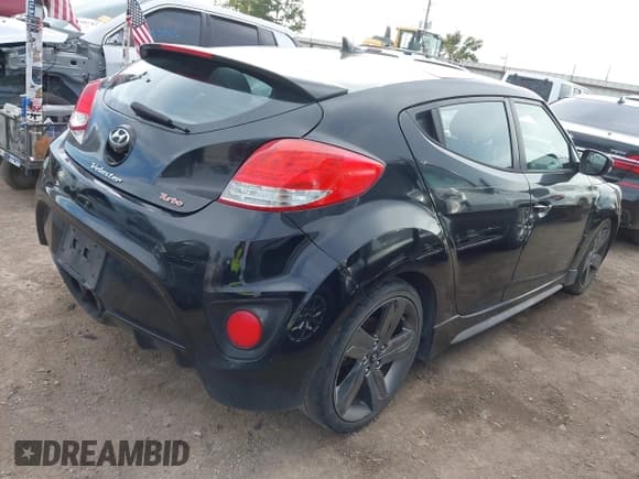 ✅ 2015 Hyundai Veloster Turbo • VIN: KMHTC6AE4FU238948 • Lot: 43525056. Listed on IAAI with 90,835 mi. Free auction sales archive from the USA and detailed vehicle history report at DreamBid. Image 4.