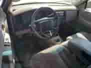 2002 Dodge Dakota Sport z VIN 1B7GL32XX2S588725, wystawiony jako Copart lot #65541345 z przebiegiem 205 568 mil mil oraz Szkoda całkowita • Salvage title. Historia ofert i sprzedaży dostępna na DreamBid. Obrazek 8.