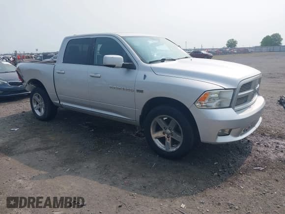 ✅ 2012 Ram 1500 Sport • VIN: 1C6RD7MTXCS114404 • Lot: 42382230. Listed on IAAI with 192,326 mi. Free auction sales archive from the USA and detailed vehicle history report at DreamBid. Image 1.