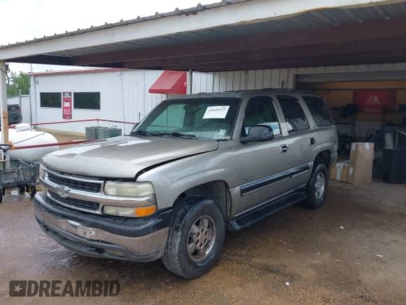 2001 Chevrolet Tahoe LT z VIN 1GNEK13T51J186505, wystawiony jako IAAI lot #42648332 z przebiegiem 282 884 mil mil oraz . Historia ofert i sprzedaży dostępna na DreamBid. Obrazek 6.