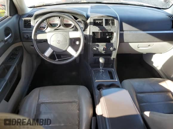 2008 Dodge Charger с VIN 2B3LA43G68H133896, выставлен на аукционе Copart как лот 80021964 с пробегом 169 917 миль миль и Списание • Salvage title. История ставок и продаж доступна на DreamBid. Изображение 8.