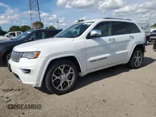 ✅ 2019 Jeep Grand Cherokee Overland • VIN: 1C4RJFCG5KC590780 • Lot: 64016825. Listed on Copart with 26,694 mi. Free auction sales archive from the USA and detailed vehicle history report at DreamBid. Image 1.
