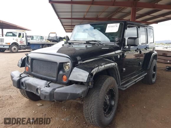 ✅ 2008 Jeep Wrangler Unlimited Sahara • VIN: 1J8GA59128L542384 • Lot: 42184176. Listed on IAAI with 152,768 mi. Free auction sales archive from the USA and detailed vehicle history report at DreamBid. Image 2.