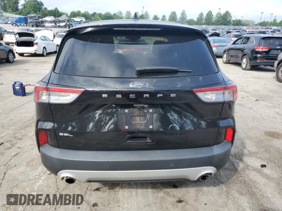 ✅ 2021 Ford Escape SEL • VIN: 1FMCU0H61MUA57764 • Lot: 60862555. Listed on Copart with 50,656 mi. Free auction sales archive from the USA and detailed vehicle history report at DreamBid. Image 6.
