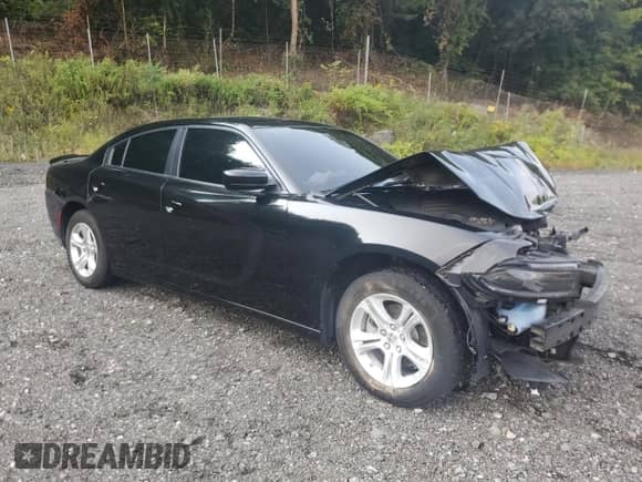 2022 Dodge Charger SXT with VIN 2C3CDXBG2NH172624, listed as a Copart auction lot 70943025 with 64,601 mi miles and Salvage title. Bid and sale history available at DreamBid. Image 4.