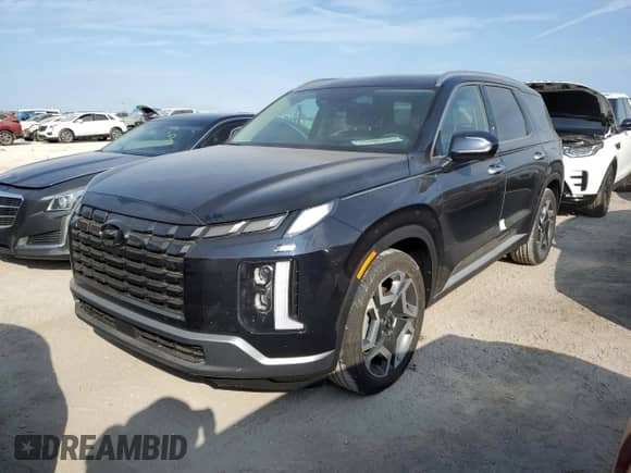 2023 Hyundai Palisade Limited с VIN KM8R54GE6PU488273, выставлен на аукционе Copart как лот 74892074 с пробегом Не указан миль и Списание • Salvage title. История ставок и продаж доступна на DreamBid. Изображение 1.