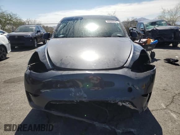 ✅ 2025 Tesla Model Y Long Range • VIN: 7SAYGDED2SF266130 • Lot: 80688045. Wystawiony na Copart z przebiegiem 7 556 mil. Bezpłatny archiwum sprzedaży aukcyjnych z USA i szczegółowy raport historii pojazdu na DreamBid. Zdjęcie 5.