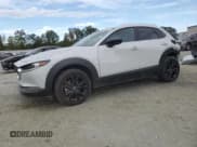 ✅ 2025 Mazda CX-30 S Select Sport • VIN: 3MVDMBBM9SM813787 • Лот: 82325445. Опубликован ранее на Copart с пробегом 12 582 миль. Бесплатный доступ к архиву аукционных продаж из США и подробный отчёт об истории автомобиля на DreamBid. Изображение 1.