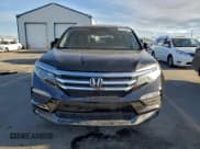 ✅ 2017 Honda Pilot EX-L • VIN: 5FNYF6H57HB017315 • Lot: 95162905. Listed on Copart with 76,964 mi. Free auction sales archive from the USA and detailed vehicle history report at DreamBid. Image 5.