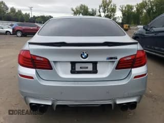 ✅ 2014 BMW M5 • VIN: WBSFV9C58ED097772 • Lot: 69424734. Wystawiony na Copart z przebiegiem 103 322 mil. Bezpłatny archiwum sprzedaży aukcyjnych z USA i szczegółowy raport historii pojazdu na DreamBid. Zdjęcie 6.