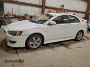 ✅ 2014 Mitsubishi Lancer ES • VIN: JA32U2FU5EU604466 • Lot: 94666035. Listed on Copart with 129,583 mi. Free auction sales archive from the USA and detailed vehicle history report at DreamBid. Image 1.